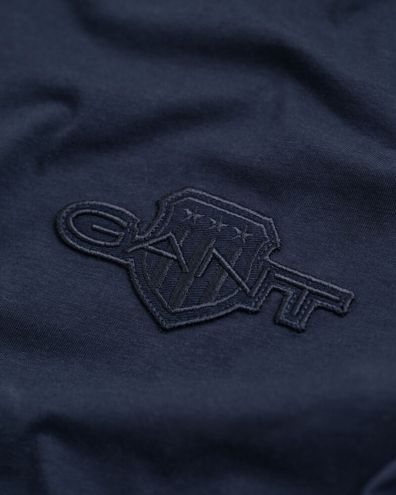 REGULAR TONAL SHIELD SS T-SHIRT EVENING BLUE / S